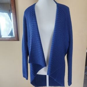 Open cardigan blue sweater.Great used condition back lace in blue size Small